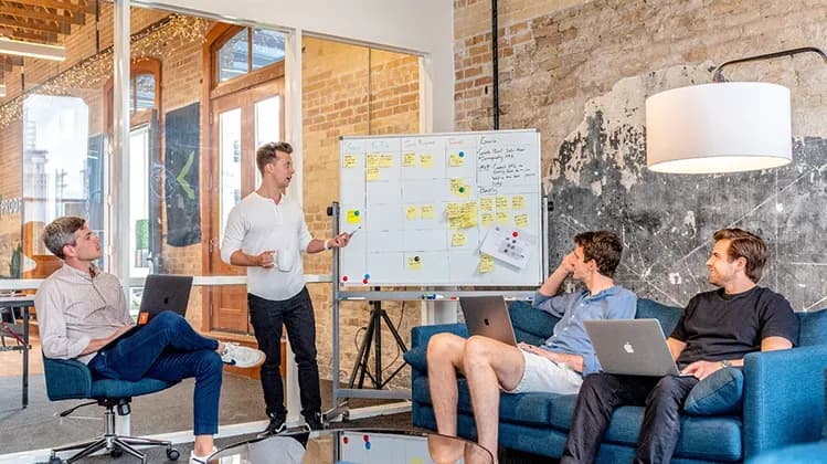 Product team collaborating during a web engineering discovery workshop